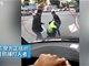 实拍揭阳一违章车主马路中央殴打交警